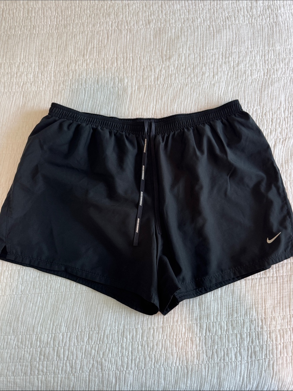 Nike Women's Black Athletic Running Shorts with Silver Swoosh